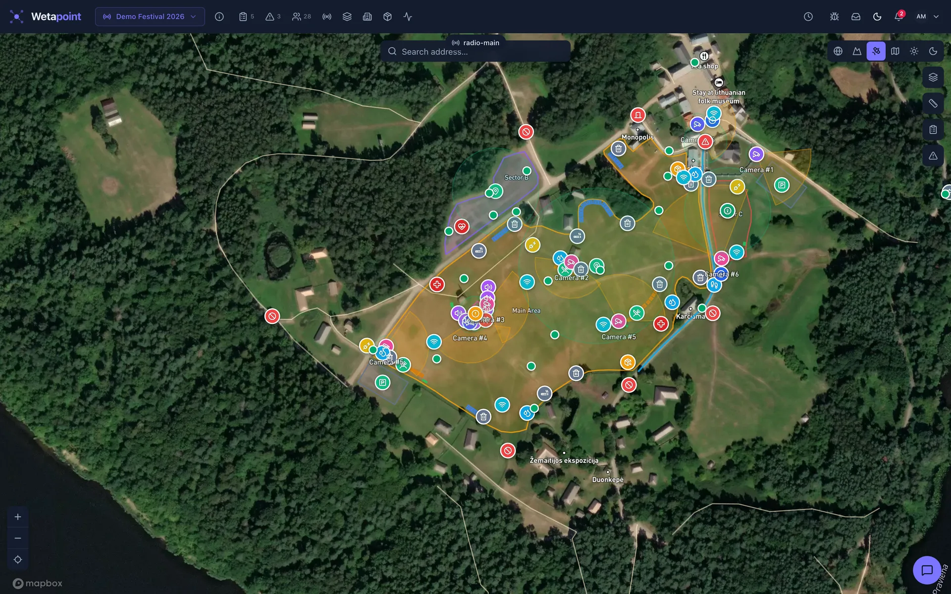 Operations console: satellite city map with zones, vehicle markers, and route coverage