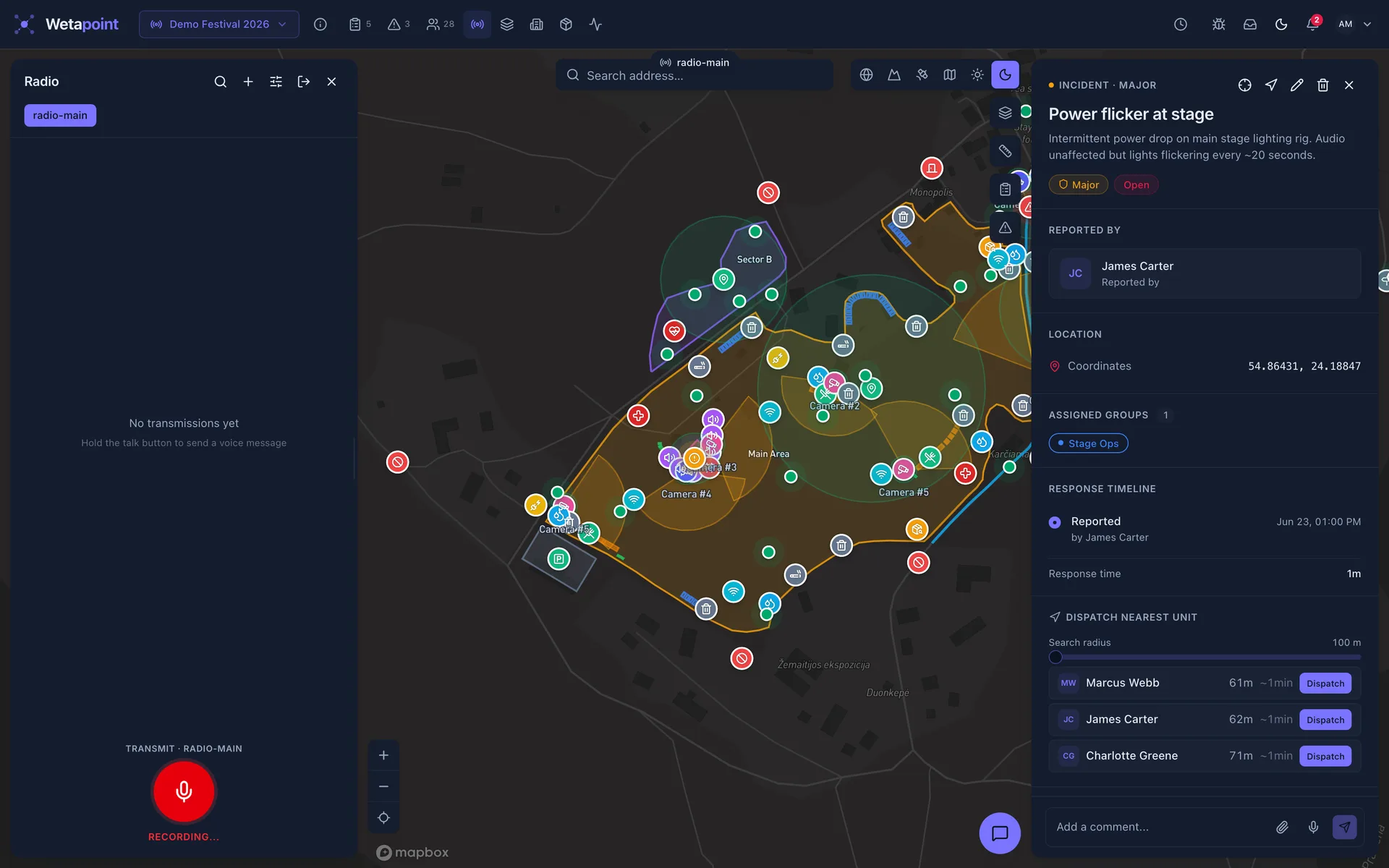 Operations console: push-to-talk radio rail mid-transmission with the patrol map behind